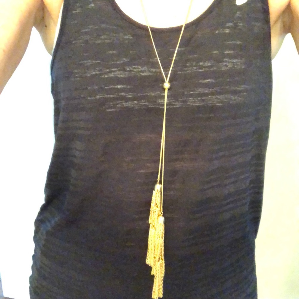 Never worn gold tassel necklace and earrings